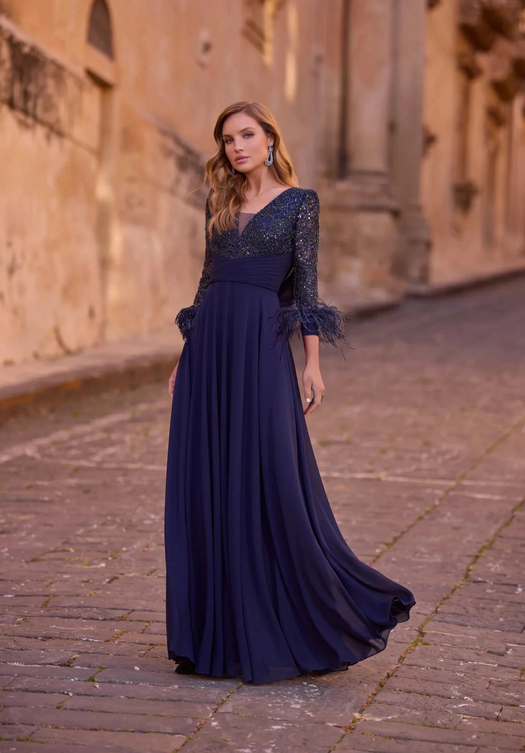 Elegant Chiffon and Mesh Dress with Puff Sleeves and Feather and Beaded Details