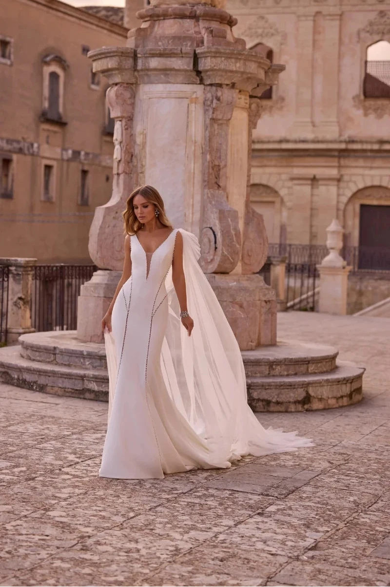 A Mermaid Wedding Dress in Crepe with Jeweled Bodice
