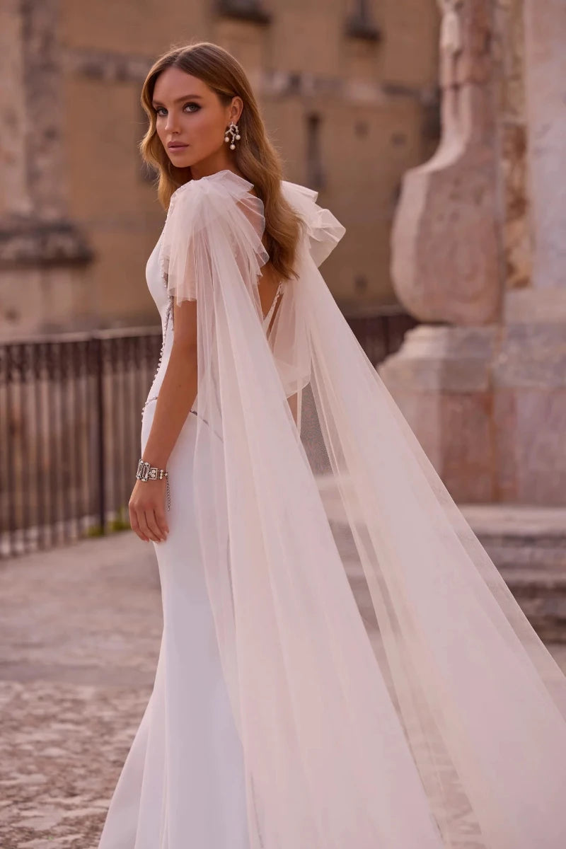 A Mermaid Wedding Dress in Crepe with Jeweled Bodice