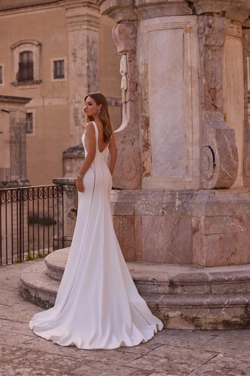 A Mermaid Wedding Dress in Crepe with Jeweled Bodice