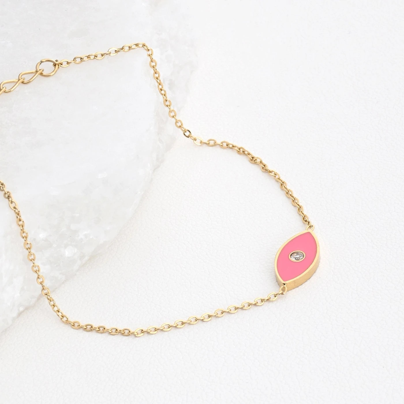 Bracciale in acciaio occhio rosa